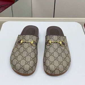 Gucci mule slippers in GG Supreme canvas